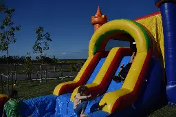 Boys Jumping Castle with a slide