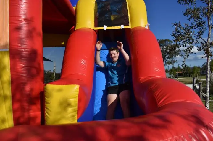 Our team on the Bounce and slide inflatable Adults enjoying our inflatable slide